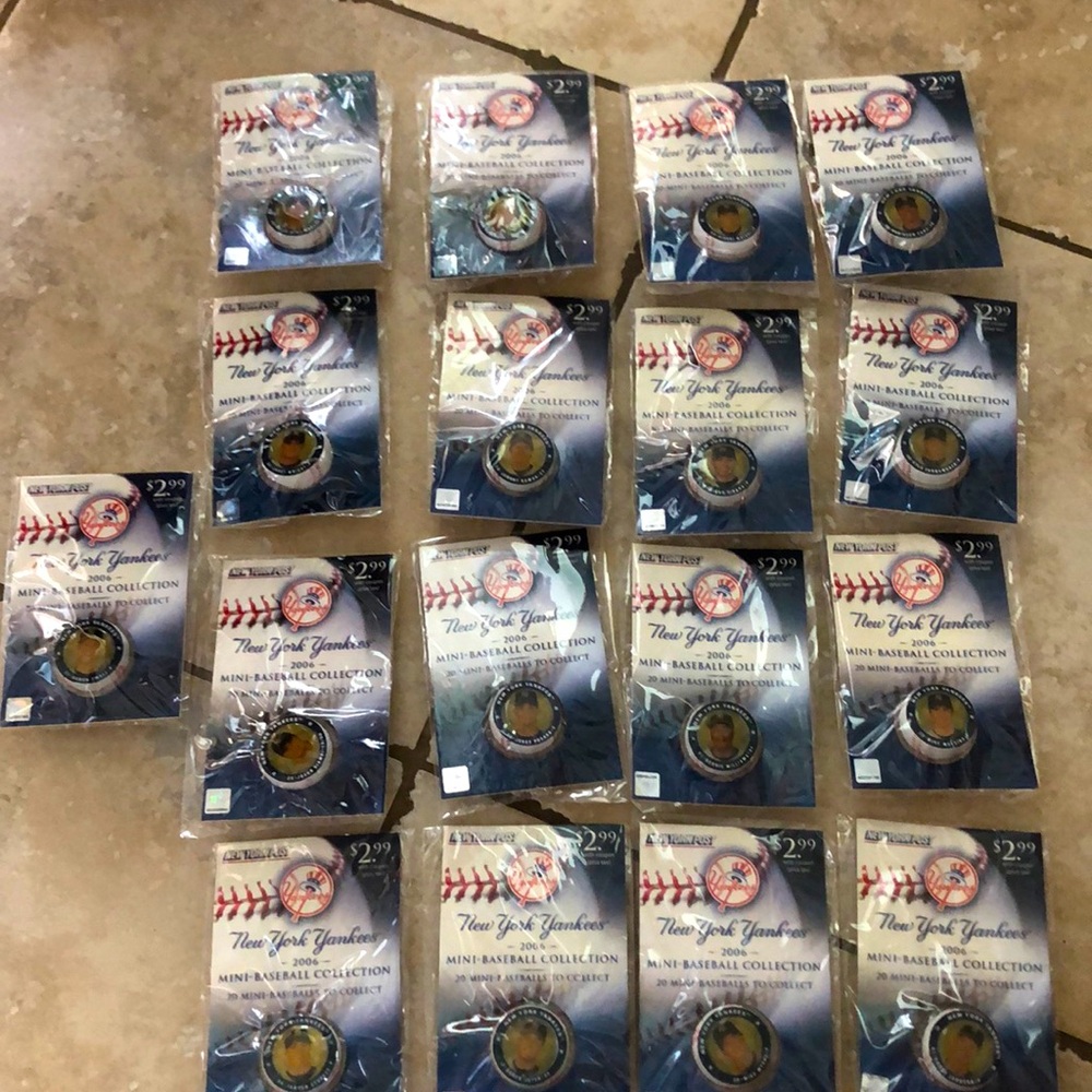 17 mini-baseballs from the 2006 NY Yankees collection, brand new, still sealed